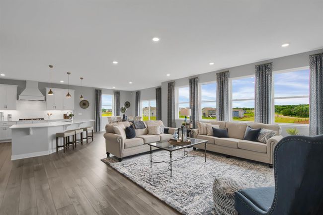 Open concept floor plan filled with natural light and perfect for entertaining and life. Model photos. Options and colors will vary. | Image 11