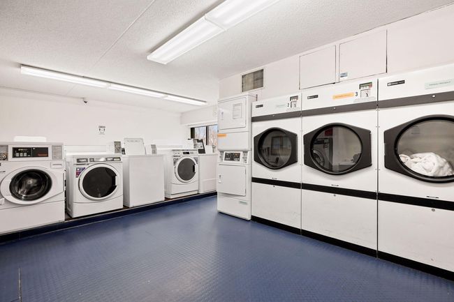Large laundry with industrial sized machines | Image 38