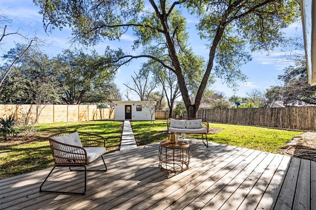 Wooden terrace featuring an outbuilding | Image 28