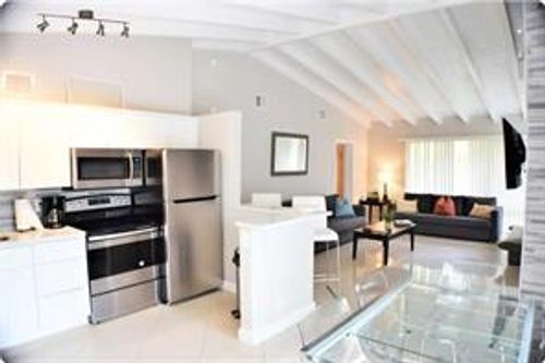 a-b-4411 E Tradewinds Ave, Lauderdale By The Sea, FL, 33308-4407 | Card Image