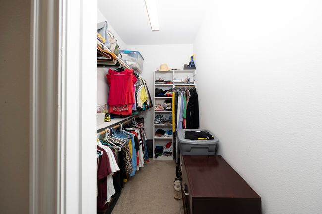 Spacious closet featuring carpet floors | Image 34