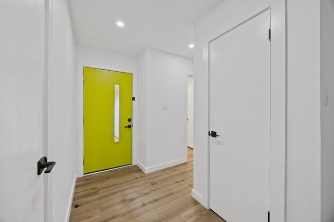 Foyer featuring light wood-style floors and recessed lighting | Image 16