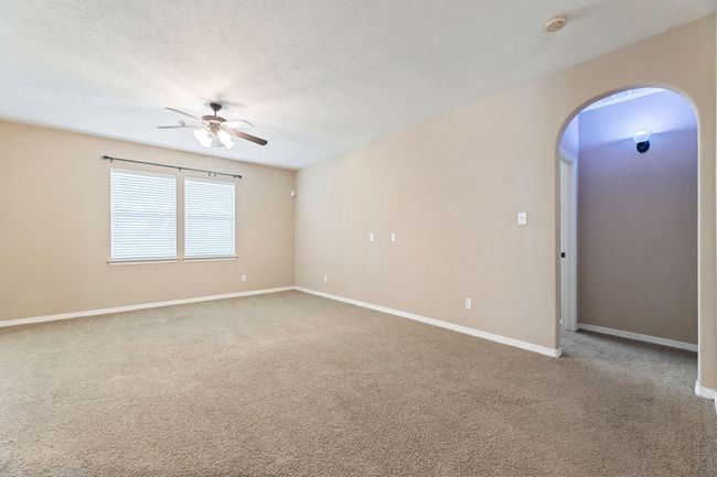 Enjoy some family time in the back room next to the kitchen and breakfast area | Image 14