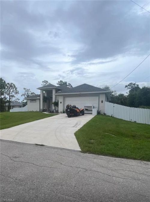 233 Baize Ave, LEHIGH ACRES, FL, 33974-9758 | Card Image