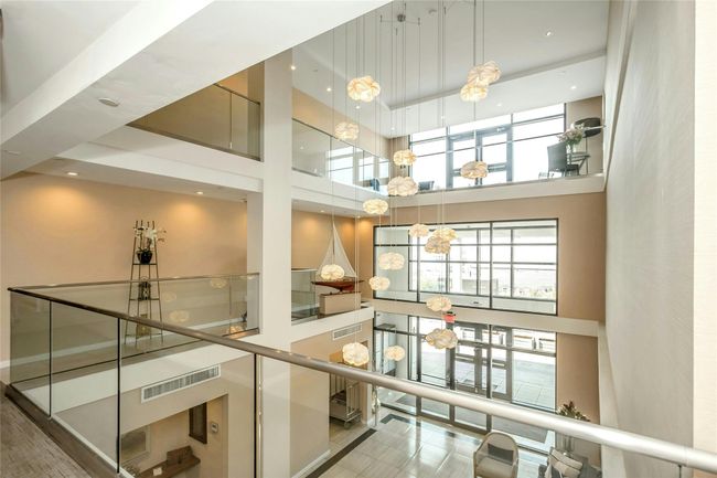 Common area with a high ceiling | Image 24
