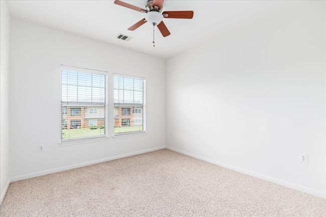 Bedroom #3 - Every room in this home is filled with light! All bedrooms also have ceiling fans. | Image 24