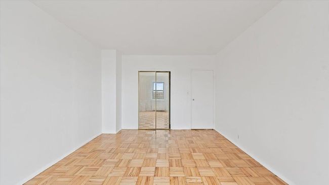 Spare room featuring baseboards | Image 10