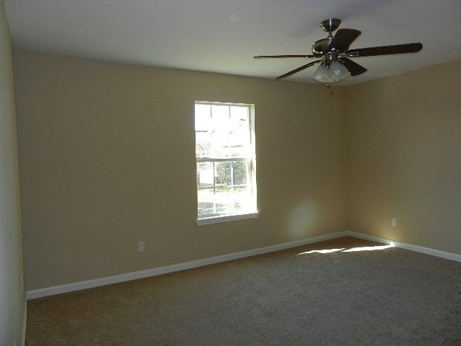 Empty room featuring carpet floors and a ceiling fan | Image 17