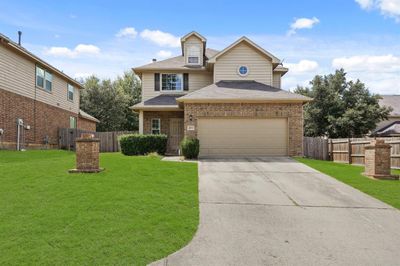 4909 Summer Ridge Drive, House other with 4 bedrooms, 2 bathrooms and null parking in Conroe TX | Image 2