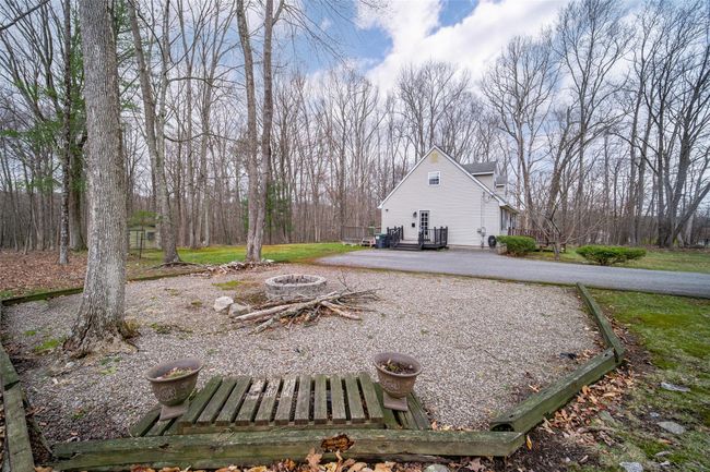 View of yard with an outdoor fire pit | Image 40