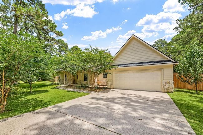 This is the view from the driveway showcasing the beautiful crape myrtle trees in front of the porch | Image 4