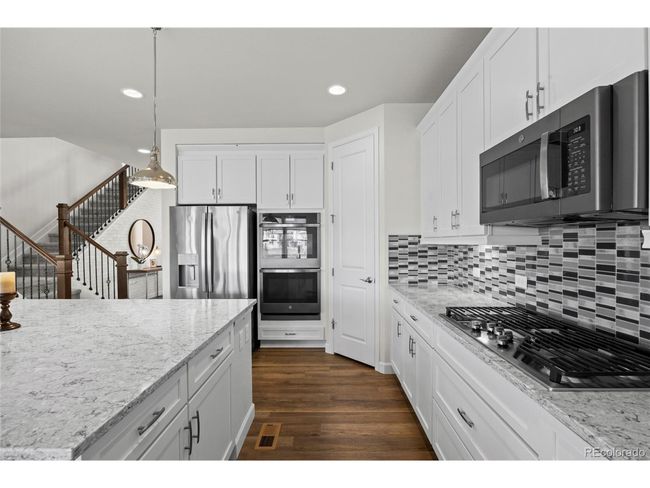 7166 S Vandriver Way, House other with 6 bedrooms, 5 bathrooms and null parking in Aurora CO | Image 9