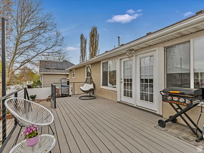 Deck view with living room entry access. | Image 32