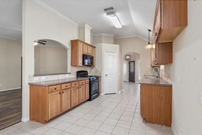 Kitchen with walk in pantry | Image 12