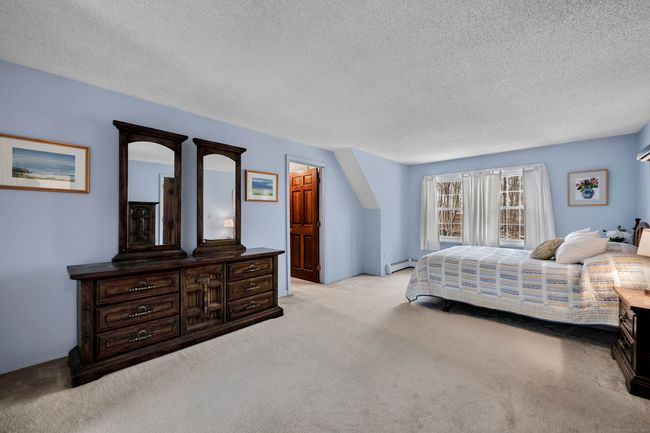 View into closet area plus easy to finish walk in attic | Image 25