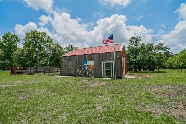 Cool looking barn w/ metal roof and extra doors for convenience. | Image 38