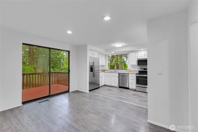 Kitchen eating area and slider | Image 16