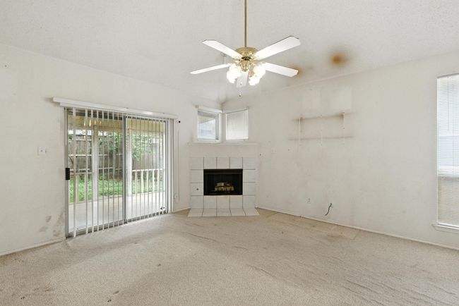 Downstairs living/dining area | Image 12
