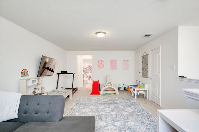 Recreation room featuring light carpet | Image 19