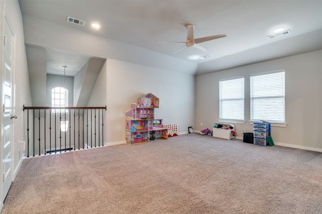 Playroom featuring ceiling fan and carpet flooring | Image 18