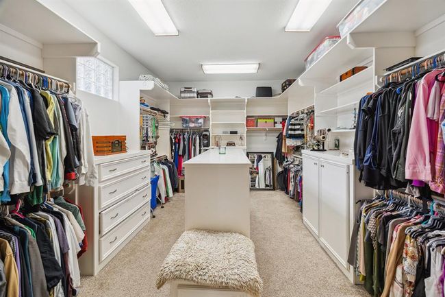Huge 20'x16' primary closet with island storage | Image 17