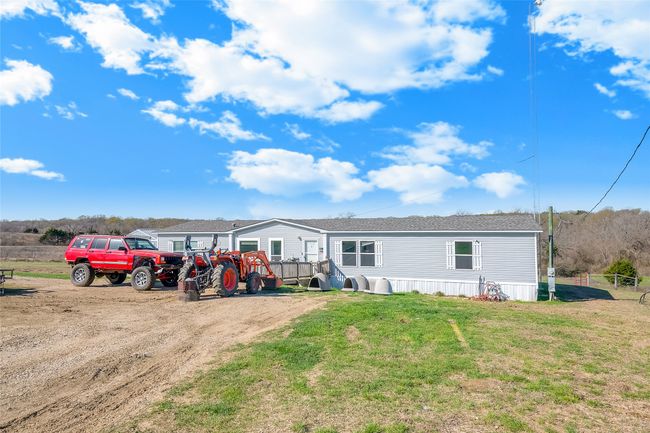 Manufactured / mobile home featuring a front lawn | Image 13