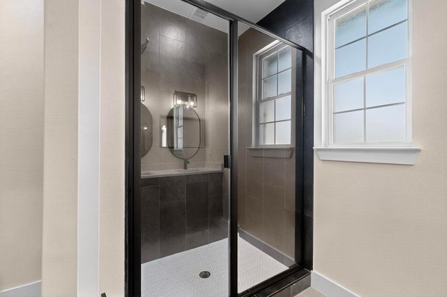 Full bathroom featuring a stall shower and baseboards | Image 14
