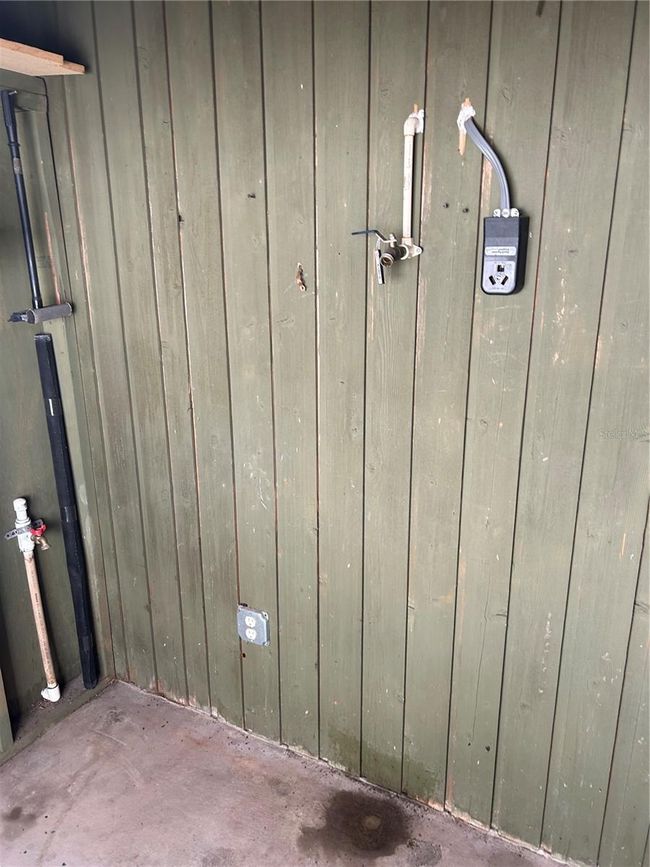 Bump out shed area with storage and washer/dryer hook ups | Image 29