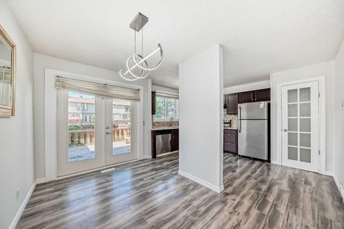 100-6103 Madigan Dr Ne, Calgary, AB, T2A5K9 | Card Image