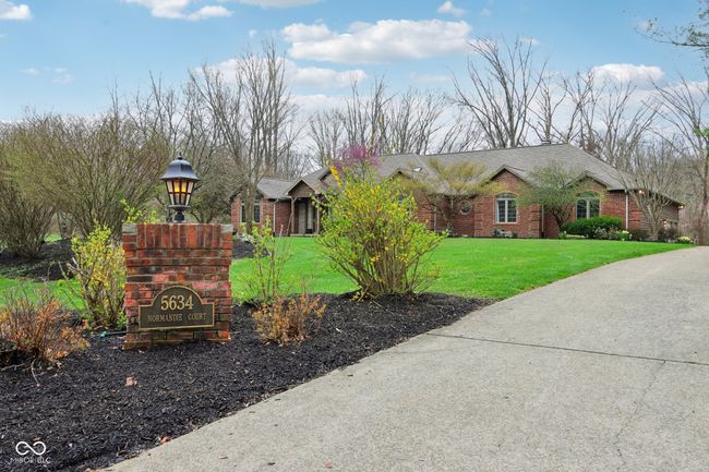 view of front of home featuring a front yard and brick siding | Image 5
