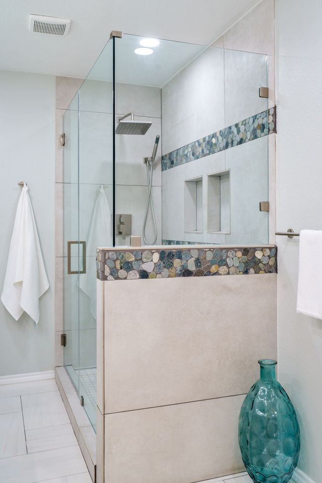 Bathroom featuring a stall shower and baseboards | Image 18