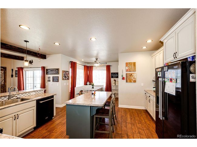 59466 E Commanche Way, House other with 3 bedrooms, 3 bathrooms and null parking in Strasburg CO | Image 12