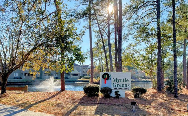 Community / neighborhood sign featuring a water view | Image 17