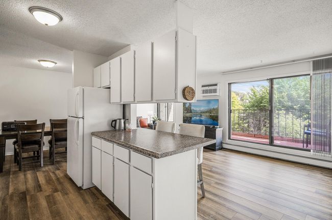 Very open floorplan between kitchen, dining, and living room | Image 18