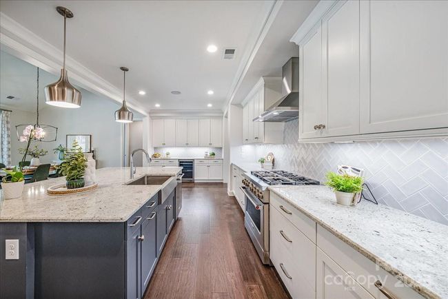 Enjoy Kitchen Aid appliances and an additiaionl, built-in beverage and coffee station | Image 13