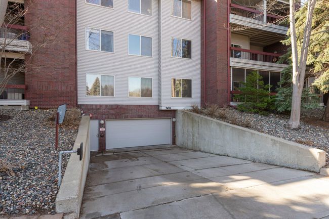 Enjoy the added convenience of a heated parking garage with one designated spot. | Image 16