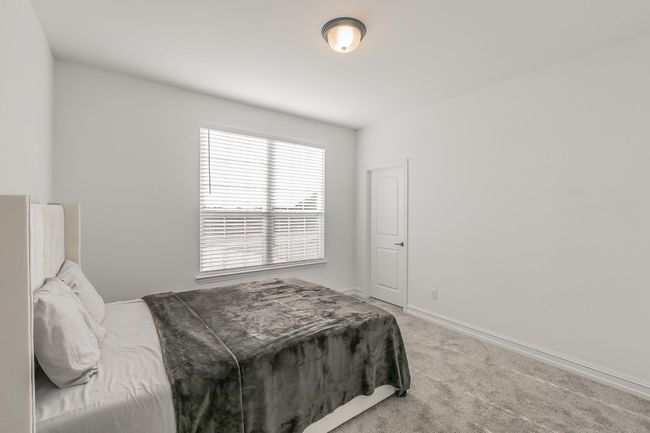View of carpeted bedroom | Image 23