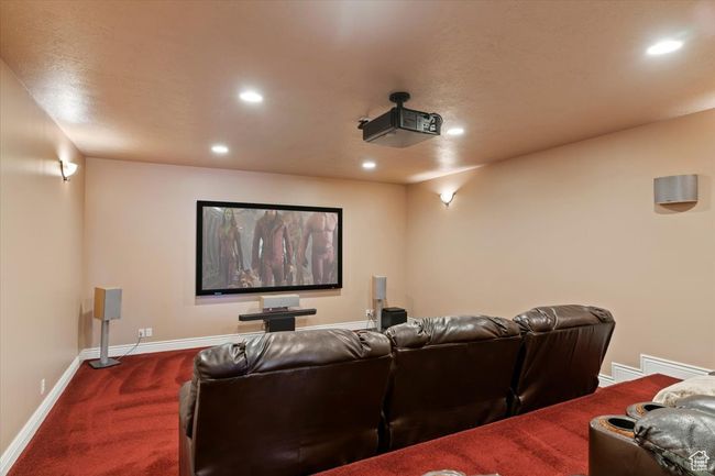 Cinema featuring recessed lighting, baseboards, and dark colored carpet | Image 23
