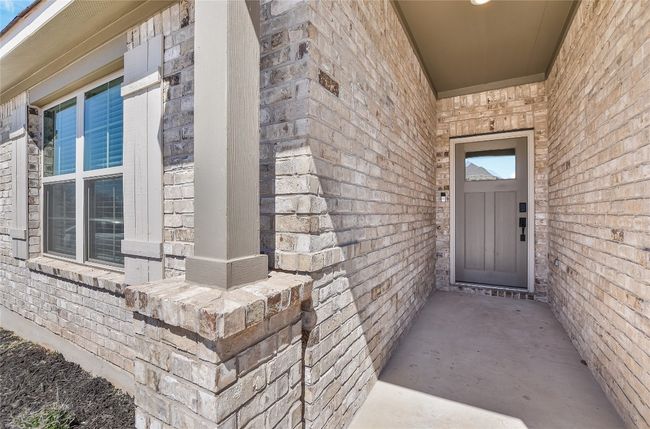 Entrance to property with brick siding | Image 5