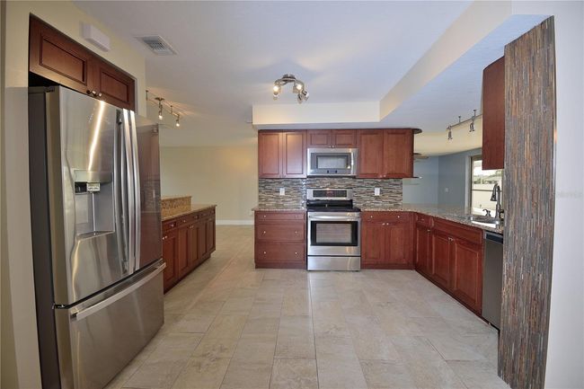 Plenty of cabinets & counterspace | Image 8