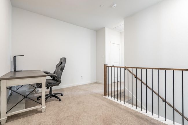 Office space with carpet floors and baseboards | Image 14
