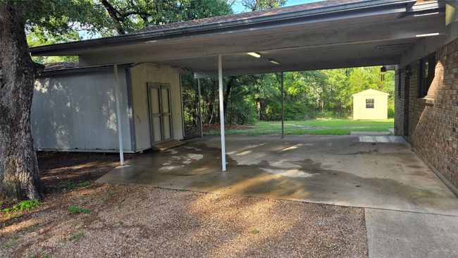 Large storage/workshop within the carport. | Image 24