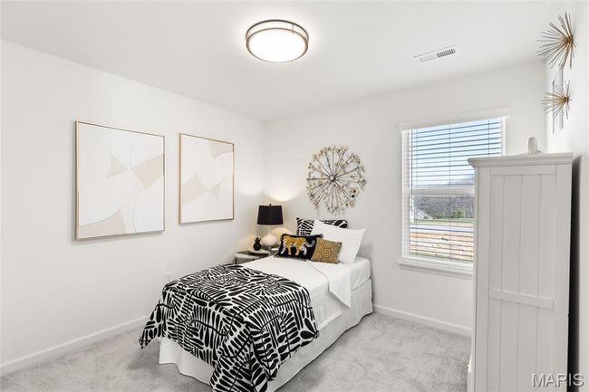 Carpeted bedroom featuring baseboards | Image 20