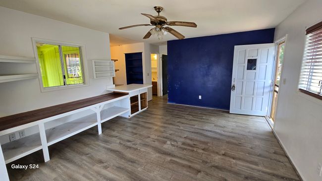 Living area towards Kitchen and Primary Bedroom | Image 7