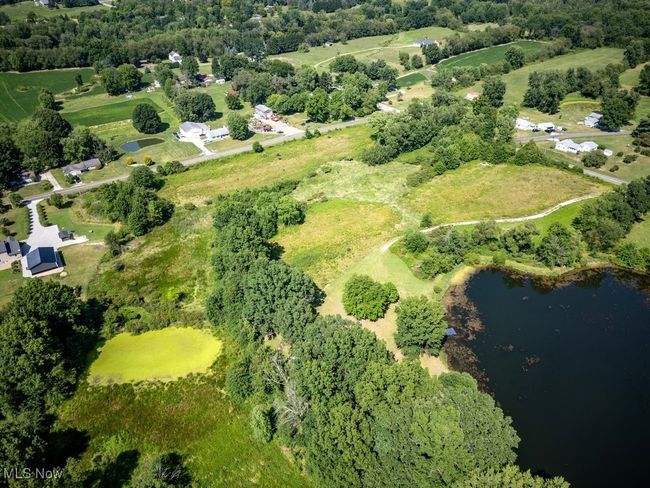 Drone / aerial view featuring a water view | Image 6