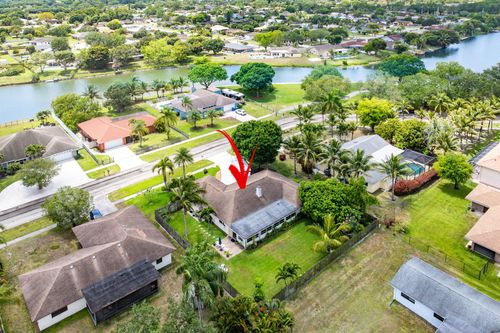 124 Rivera Ave, Royal Palm Beach, FL, 33411-1002 | Card Image