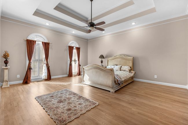 Master Bedroom downstairs with double tray ceiling | Image 15