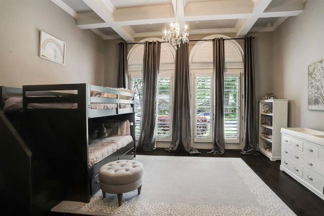 Second of two secondary bedrooms located downstairs. | Image 27