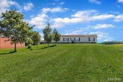 8333 S Wacousta Road, Home with 4 bedrooms, 2 bathrooms and null parking in Riley Twp MI | Image 1