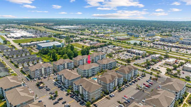 View of property location featuring a large body of water and nearby suburban area | Image 37
